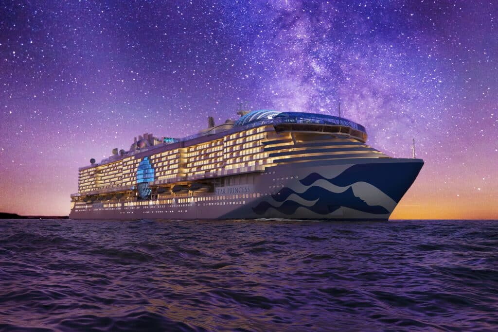 A starry night view of Princess cruise lines sailing through the purple ocean