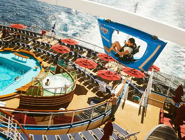 A top view of Carnival Vista deck and people enjoying