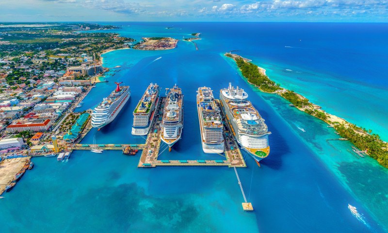 A top view of Carnival crusie ships sailing across the wide sea