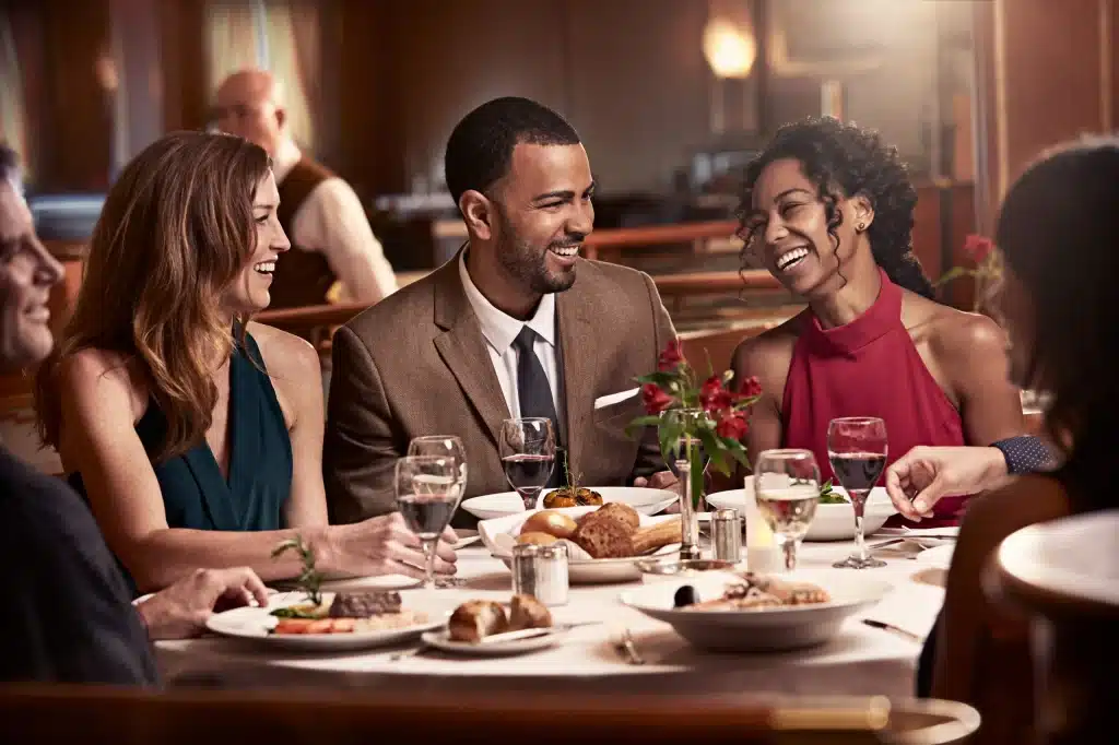 People talking and dining at a cruise ship dining table