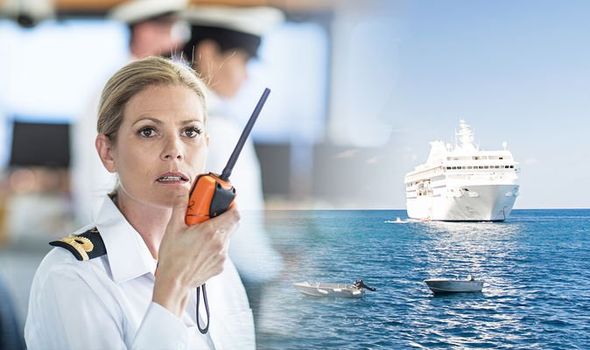 a cruise crew member having walkie takie in her hand