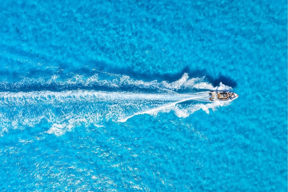 Vacation And Leisure Aerial View On Fast Boat On Azure