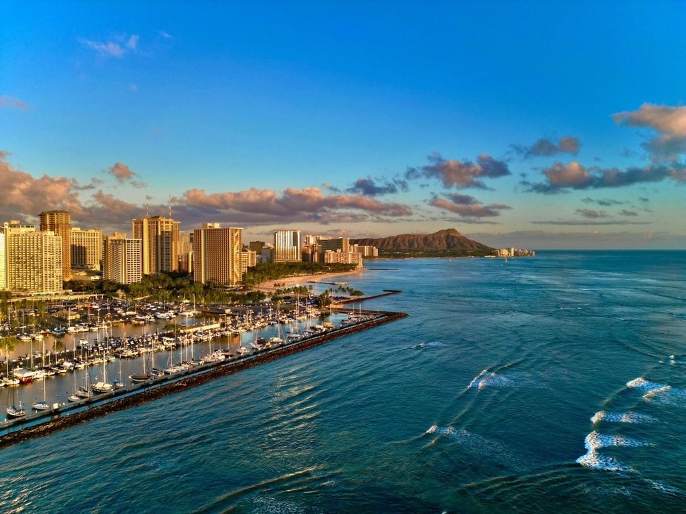 Aerial View Of A Vibrant Cityscape Of Diamond Head Sunset