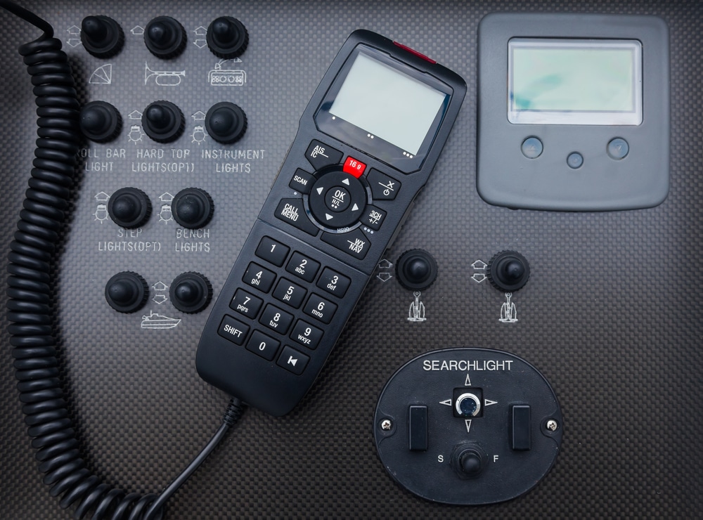 Black Dashboard On A Motor Yacht With Control Buttons And